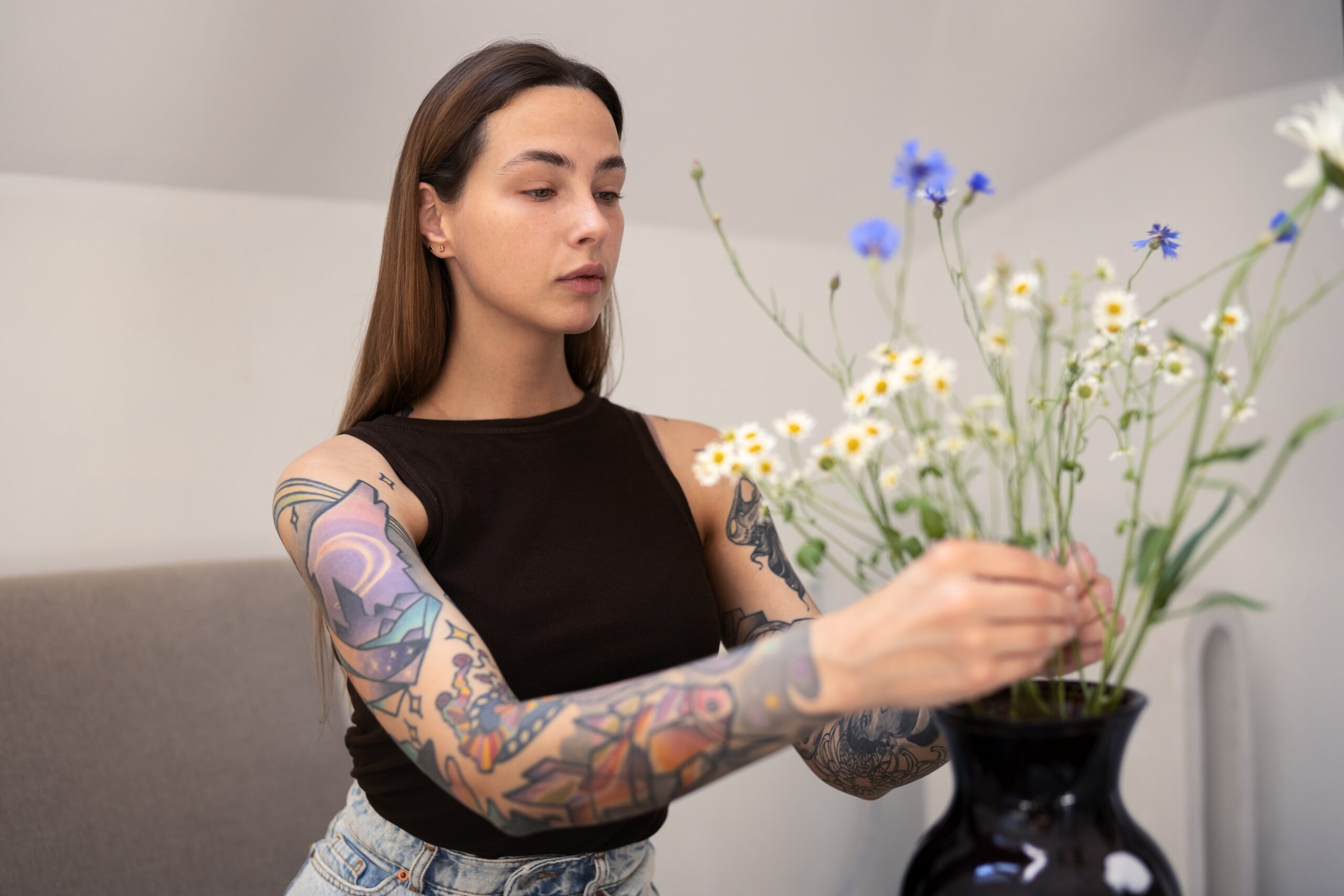 Tattoo care goes mainstream Tattooed lady with flowers