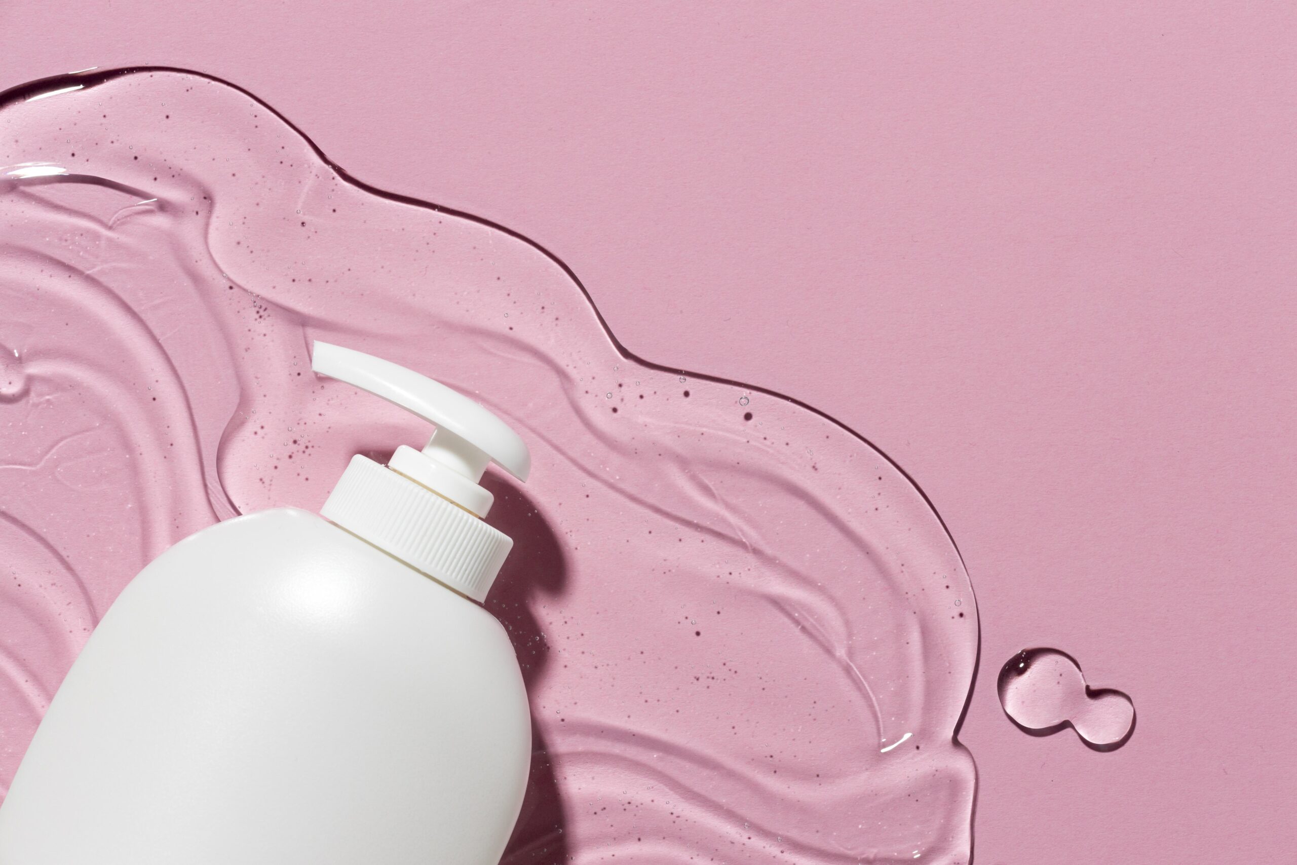 intimate cosmetics bottle inspired by skincare on pink background