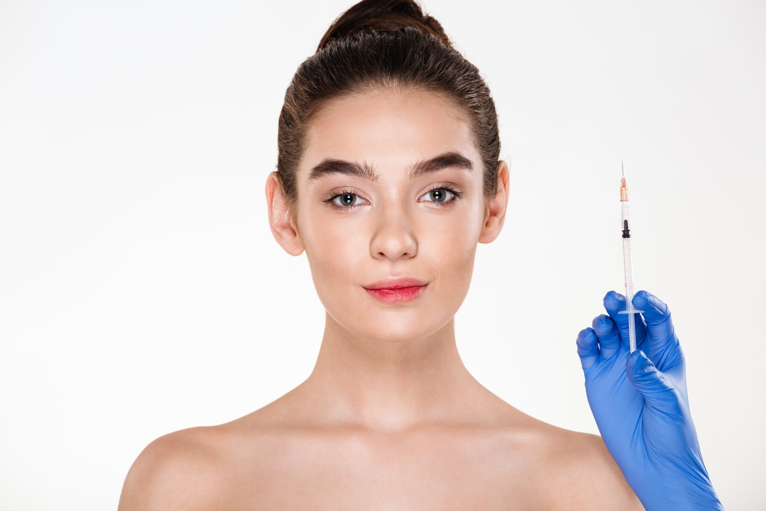 woman with botox syringe