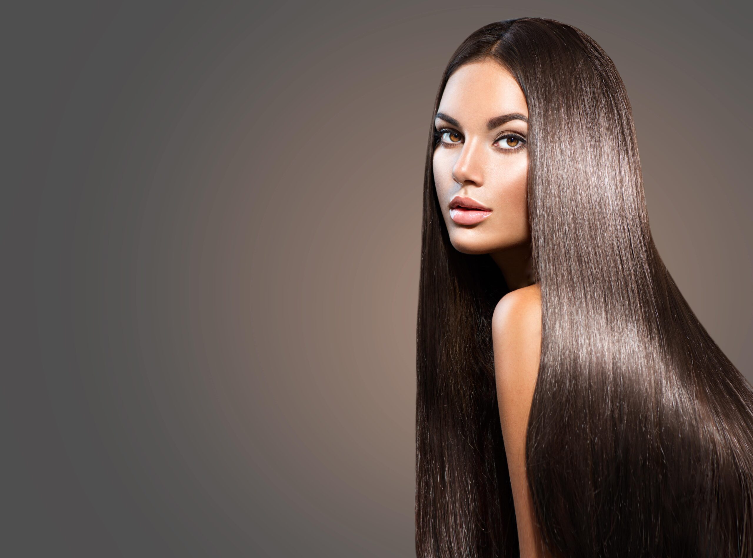 woman with long, dark, super shiny hair